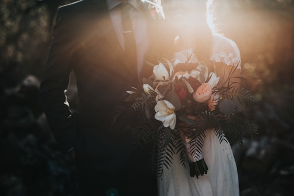 Golden-hour wedding bouquet portrait